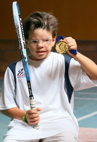 Juan plays squash